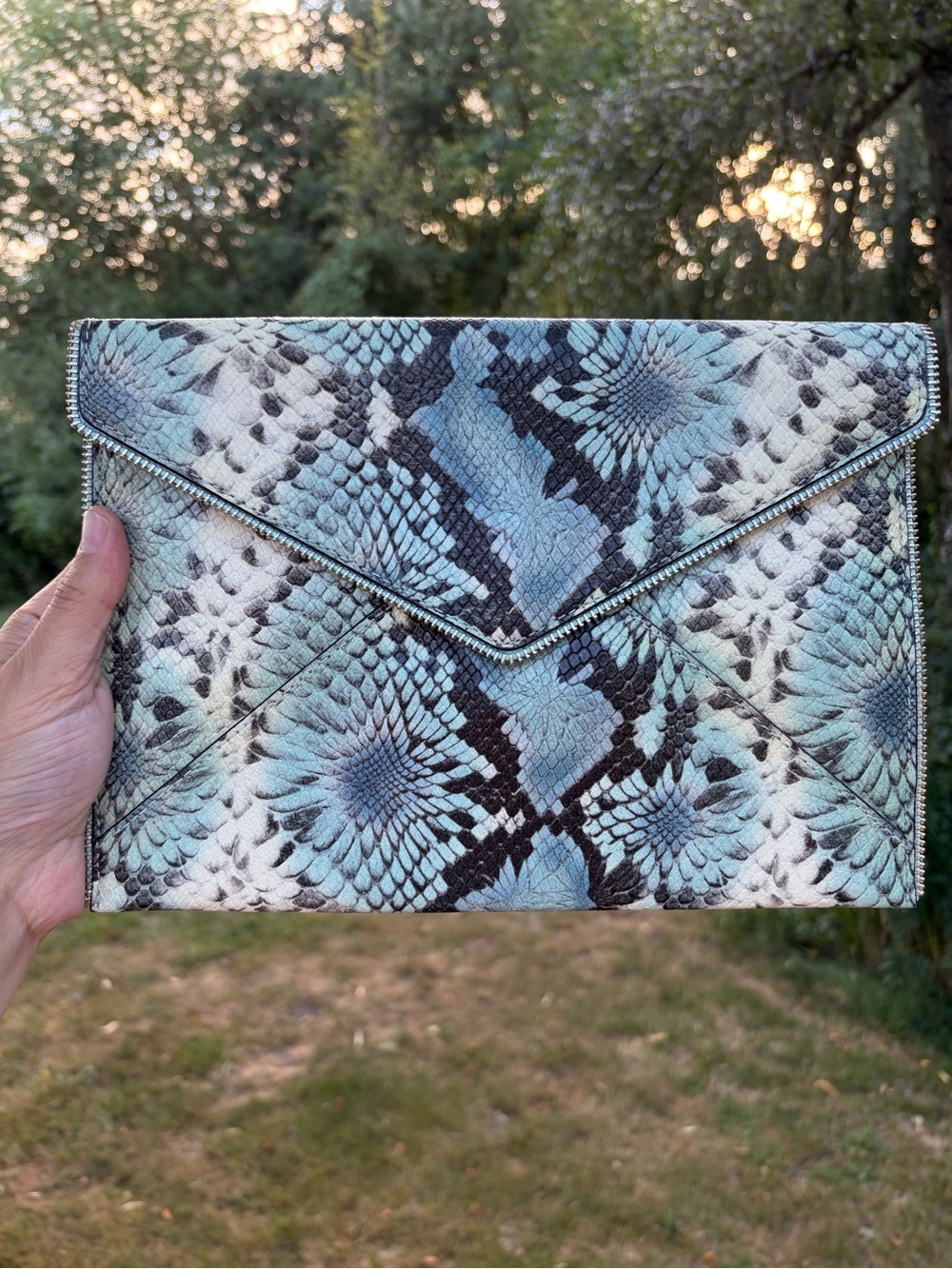 Rebecca minkoff Leo envelope clutch snakeskin embossed leather edgy zipper trim